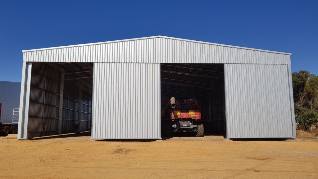 Machinery shed with sliding doors