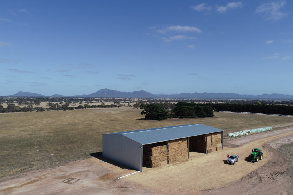 Four bay hay shed drone photo