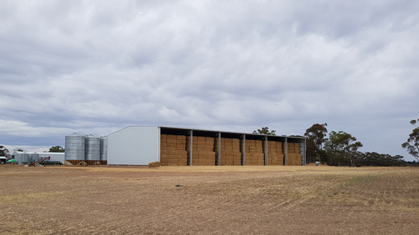 You are currently viewing A 51m x 30m open front hay shed with sliding doors at one end for future machinery storage