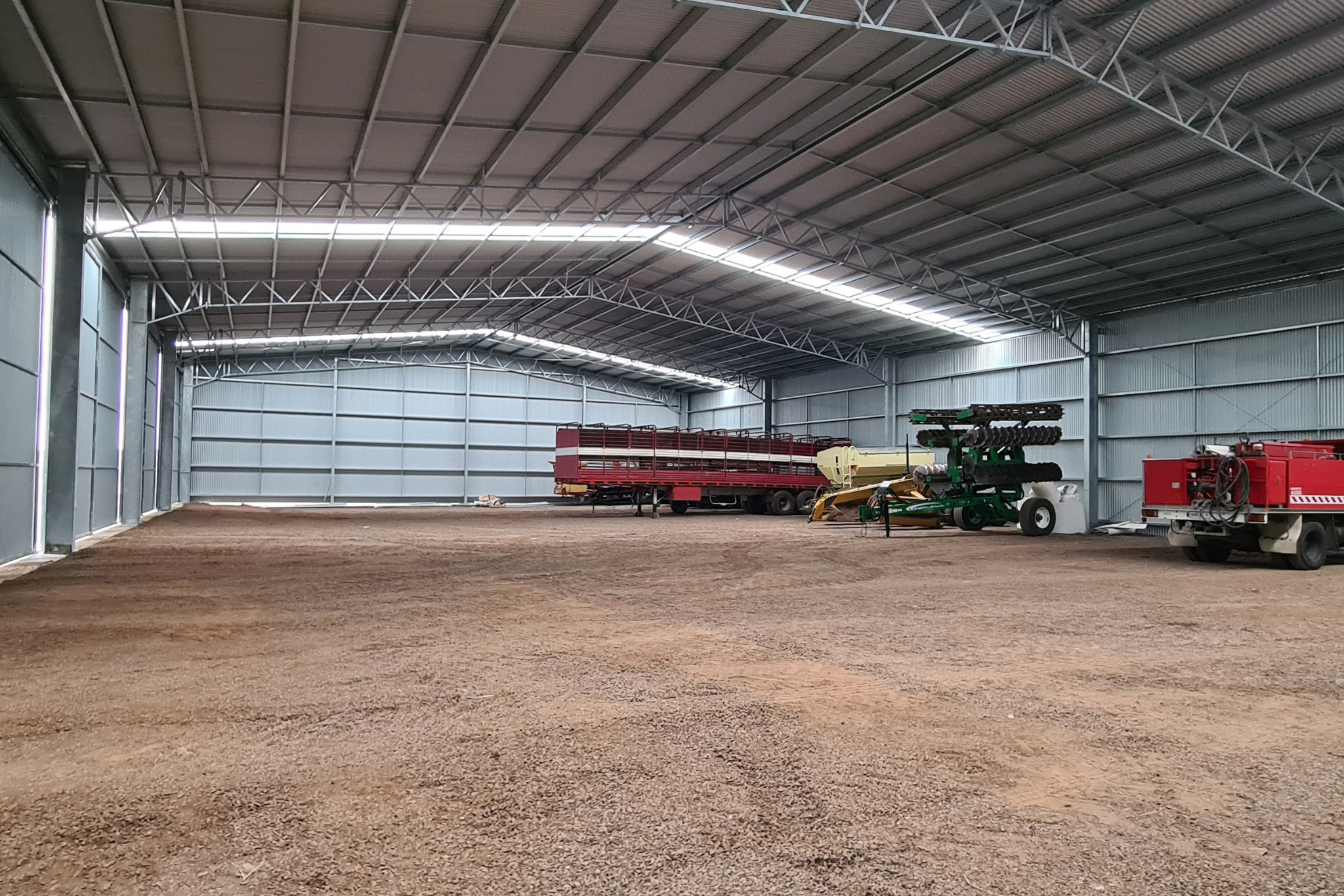 Enclosed machinery shed with skylight