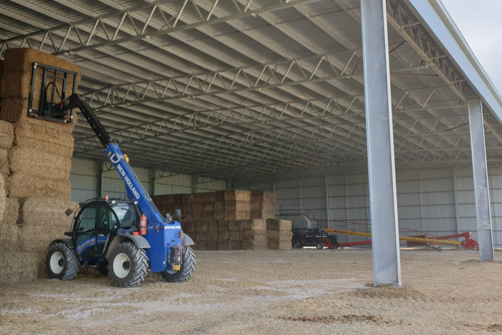 Hay shed with girder trusses