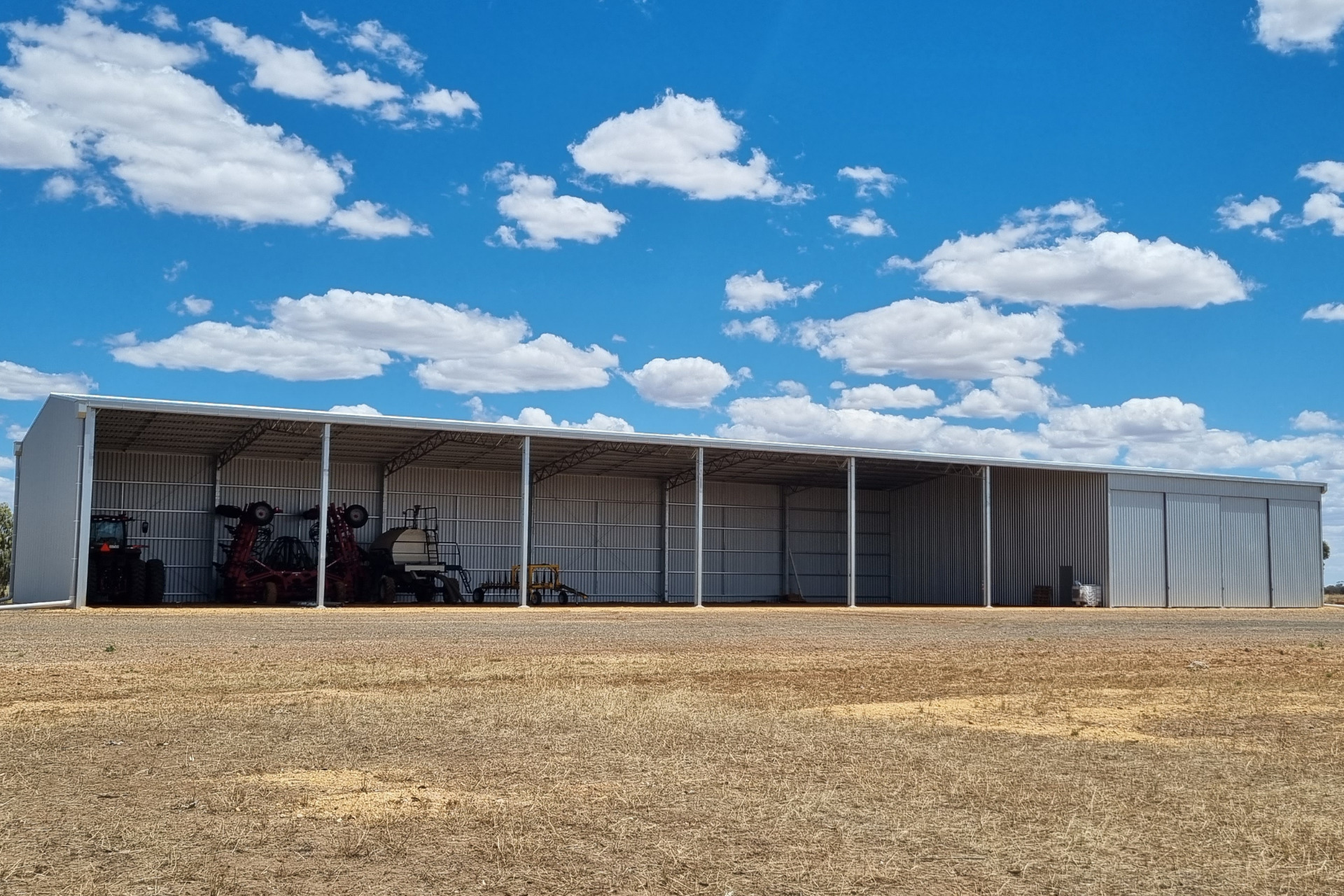 A 64m x 18m machinery shed with enclosed bay