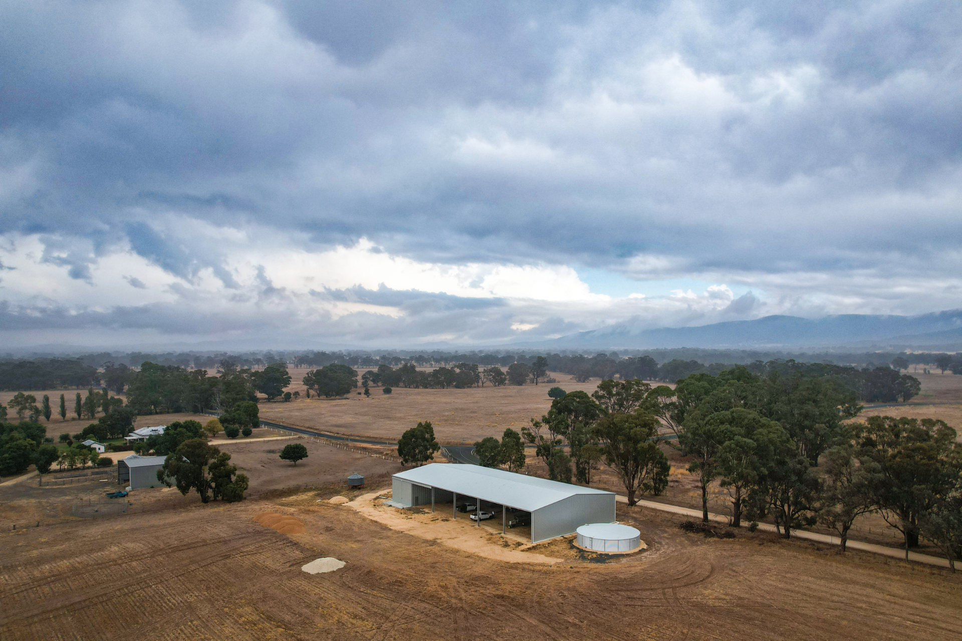 A 48m x 24m x 6m machinery shed with one bay enclosed at Avoca VIC
