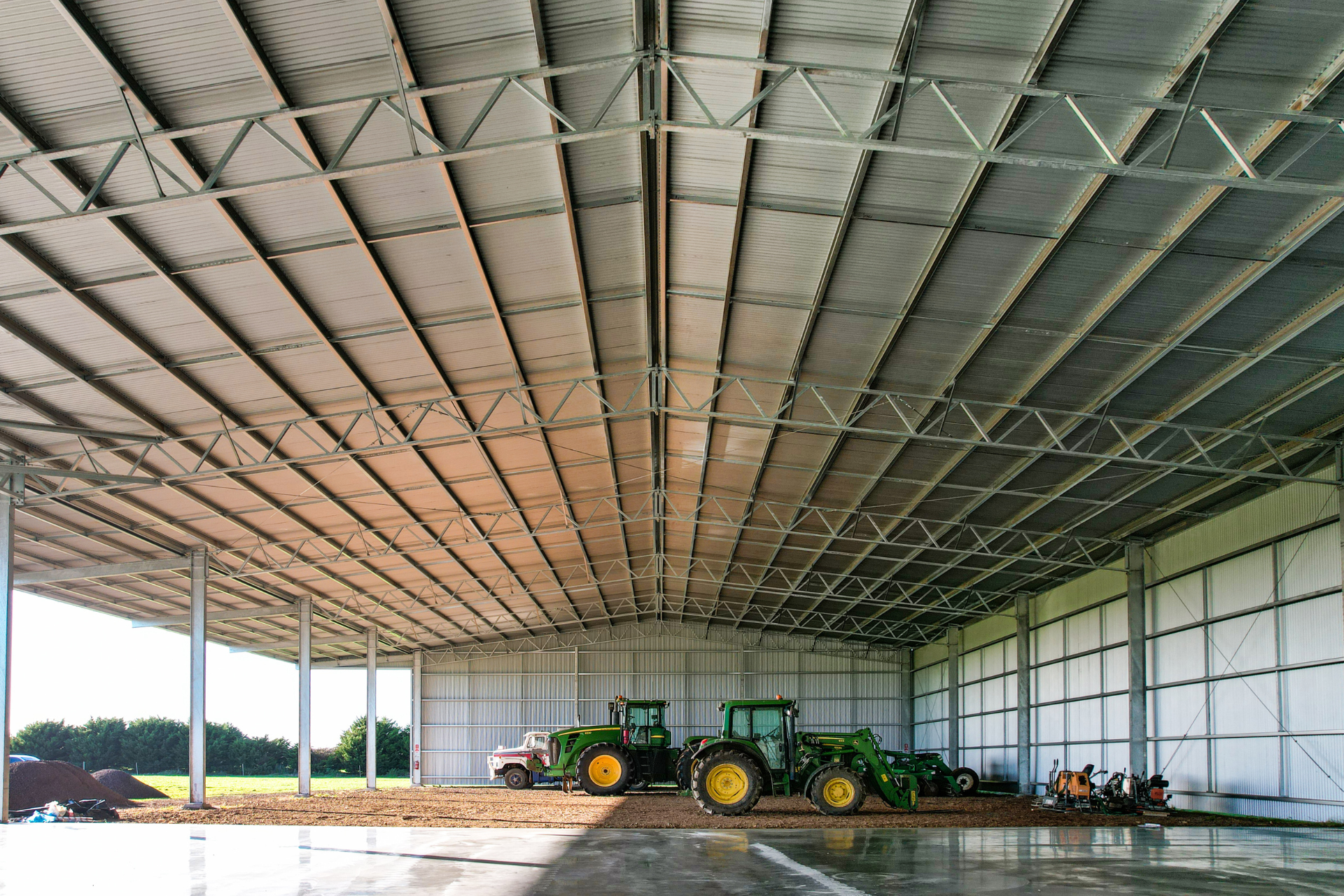 A 56m x 24m x 6.75m machinery shed with 6 metre canopy at Carranballac VIC