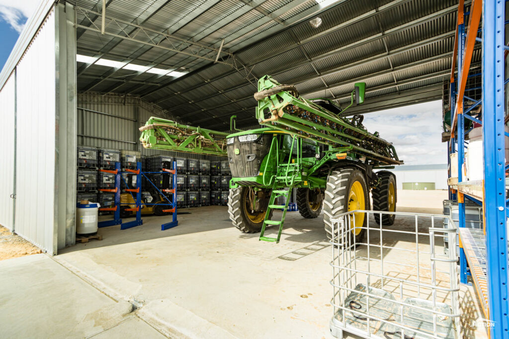 compliant chemical shed design with sprayer bay and pallet racking