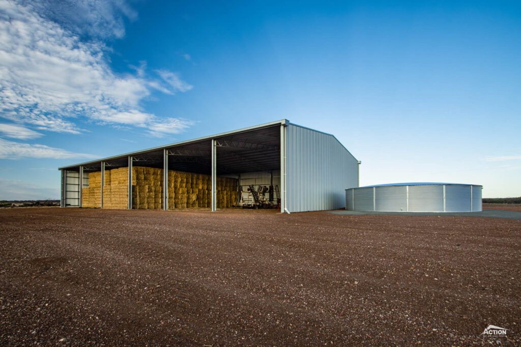 open front hay shed with custom gutter and tank