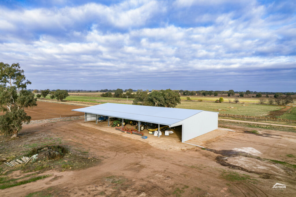 Drone photo of 24m span machinery shed with canopy