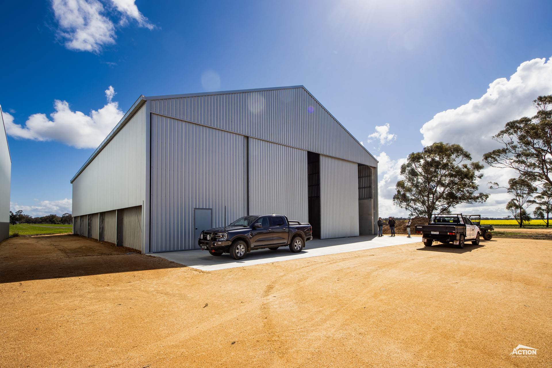 Grain Shed Design - Concrete apron and sliding doors on grain shed